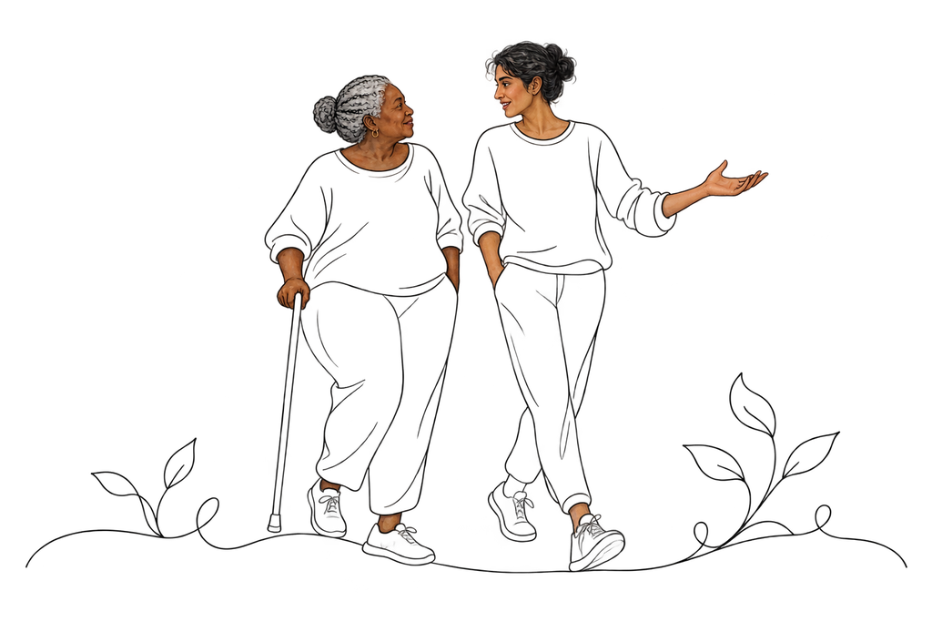 An older woman with a cane and a younger companion walking side by side